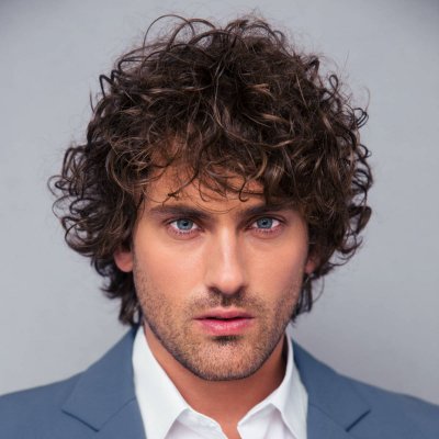 Top of hairstyles for curly hair men
