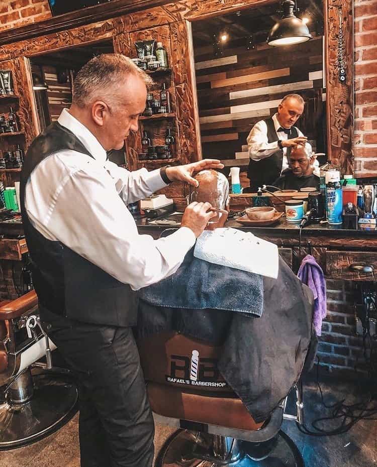 What services are provided at Rafael's Barbershop vintage
